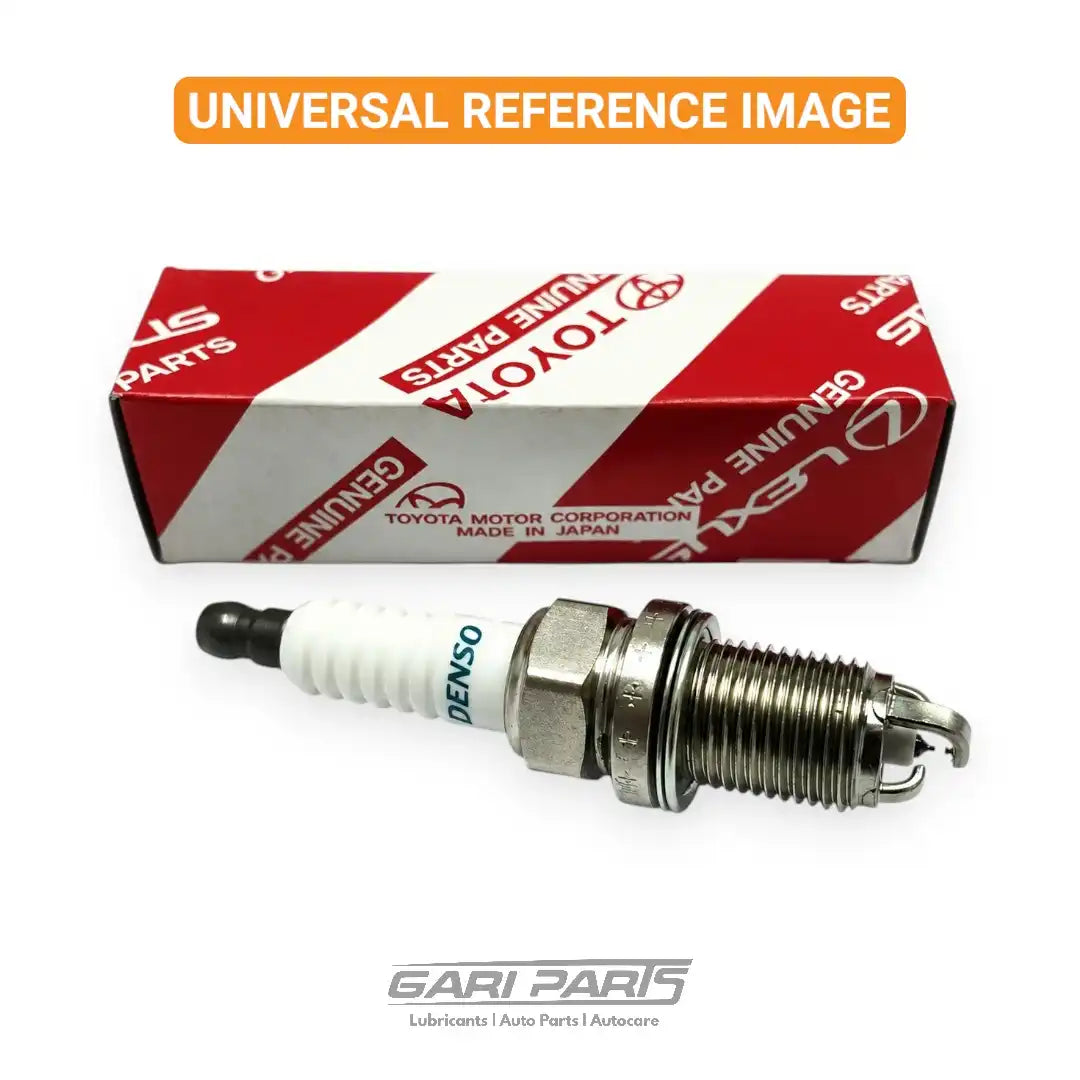 A Toyota genuine spark plug with a white ceramic insulator and a silver metal electrode, resting on its red and white branded packaging box against a white background.