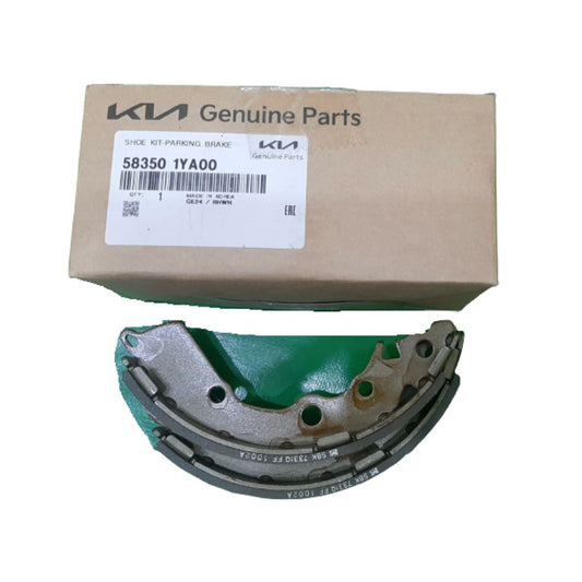 A KIA PICANTO genuine brake shoe rear part, model 58350-1YA00, is displayed with its packaging. The product is made of metal with a green and silver finish, and it is shown in front of its packaging box labeled with the KIA brand and part number.